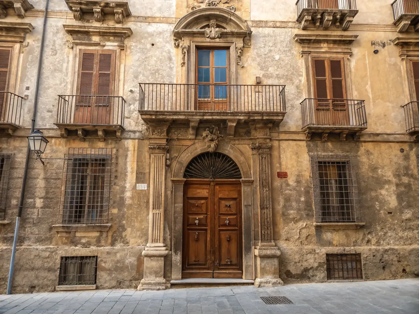 A beautifully restored stone building in Ally-Drignac, showcasing the organization's heritage restoration efforts. The image should convey a sense of history and preservation.